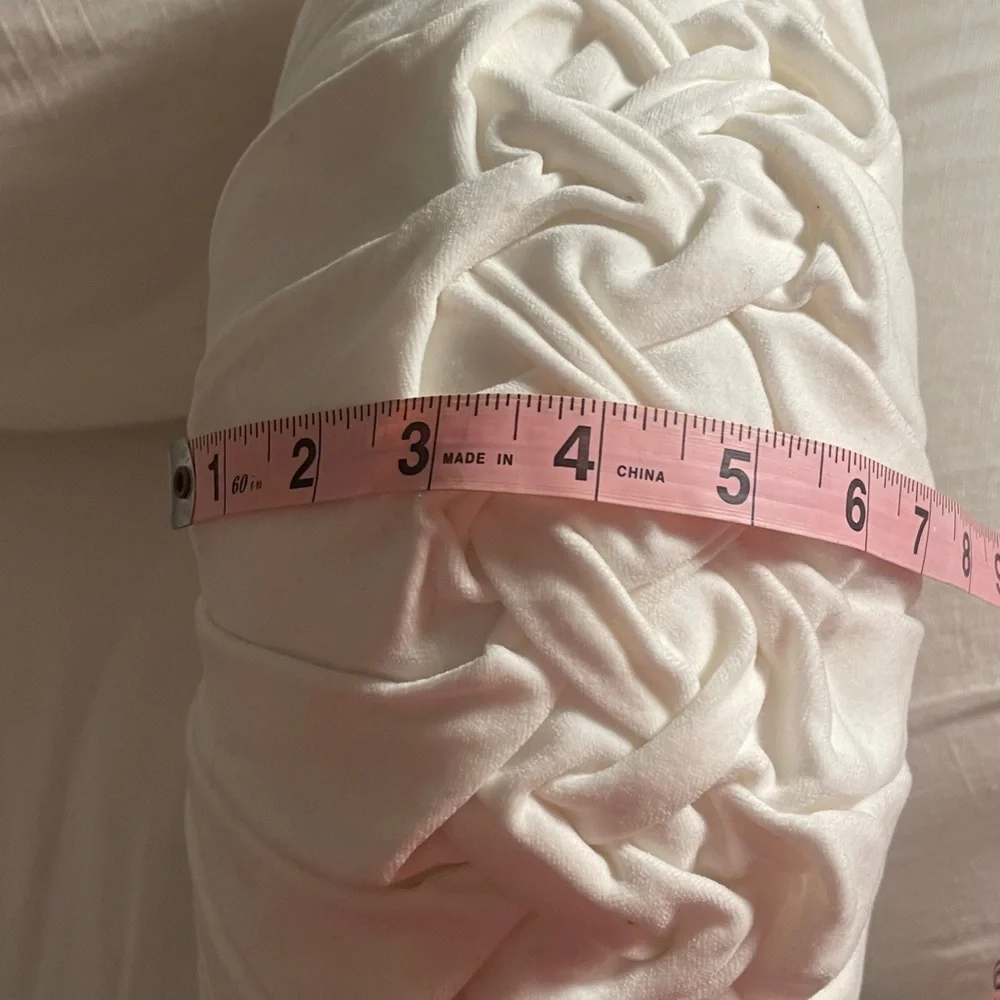 Round white velvet tufted pillow